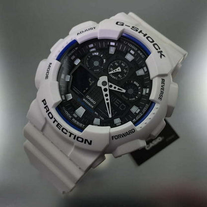 Casio Men's GA-100 Series G-Shock Quartz 200M WR Shock Resistant Watch White/Black. Plastic Band